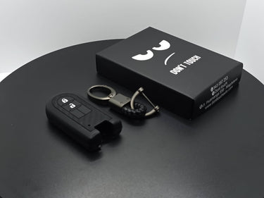 funda llave fibra/silicona con llavero